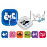 Traveling White Ear Buds with Brightly Colored Accents